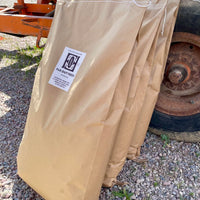 Brown bags of Far Out Feeds