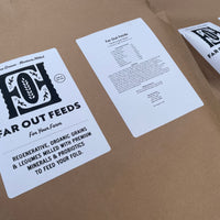 Far Out Feeds packaging with labels on a brown background